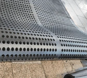 Perforated replacement rubber track for tumble shot blasting machines