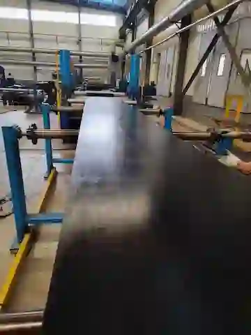 Wide steel cord conveyor belt body during factory production