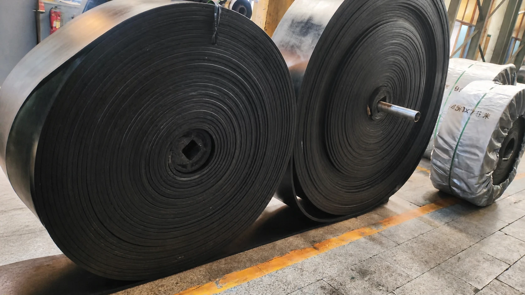Large rolls of bucket elevator belt at Hongkun factory